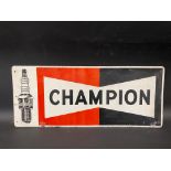 A Champion spark plugs part pictorial tin advertising sign, dated 1969, 23 x 9 1/2".