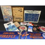 A selection of garage related ephemera including showcards, a John Bull 'Firefly' window poster, a