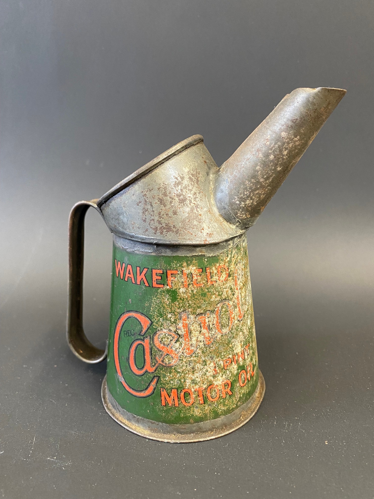 A Wakefield Castrol Motor Oil half pint measure, dated 1929. - Image 2 of 4