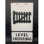 An aluminium road sign for Level Crossing with integral reflective beads, 12 x 21".