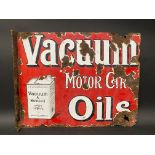 A Vacuum Motor Car Oils part pictorial double sided enamel sign with hanging flange and image of a