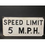 A cast aluminium road sign 'Speed Limit 5 M.P.H.' 25 1/2 x 12 1/4".
