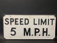A cast aluminium road sign 'Speed Limit 5 M.P.H.' 25 1/2 x 12 1/4