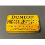 An early and rare Dunlop Midget Repair Outfit for Cycle Tyres, with image of J.B.Dunlop to the lid.