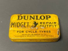 An early and rare Dunlop Midget Repair Outfit for Cycle Tyres, with image of J.B.Dunlop to the lid.