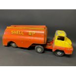 A Tri-ang tinplate model of an articulated petrol tanker in Shell BP livery.