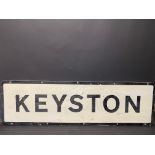 A rectangular village sign for Keyston, 48 1/2 x 14".