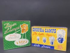 A Tiger Lamps dispensing tin and another for Endura.