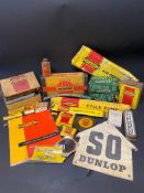 A quantity of Dunlop related packaging, tins etc.