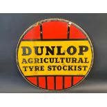 A Dunlop Agricultural Tyre Stockist circular double sided enamel sign, 24" diameter.