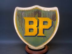 A BP shield shaped glass petrol pump globe, fully stamped 'Property of Shell-Mex & BP Ltd..'.