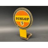 A rarely seen Dunlop advertising badge for fitting to the front of a bicycle.