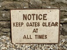 A cast iron road sign - Notice Keep Gates Clear At All Times, 26 x 19