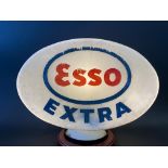 An Esso Extra glass petrol pump globe, fully stamped underneath 'Property of Esso Petroleum Co