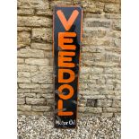 A Veedol Motor Oil narrow enamel sign, 11 1/2 x 55".