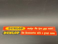 Two Dunlop advertising shelf strips.