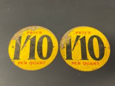 Two circular tin price indicator signs for 1'10 per quart, each 5 1/4" diameter.
