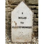 A cast iron mileage marker '5 miles to Haverfordwest', 15 1/2 x 30".