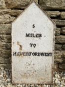 A cast iron mileage marker '5 miles to Haverfordwest', 15 1/2 x 30".