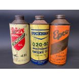 Three cylndrical quart cans including Royal Snowdrift Oil.