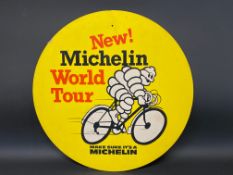 A Michelin 'World Tour' pictorial double sided card advertising sign, 25 1/2" diameter.