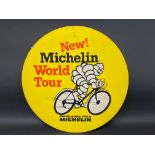 A Michelin 'World Tour' pictorial double sided card advertising sign, 25 1/2" diameter.