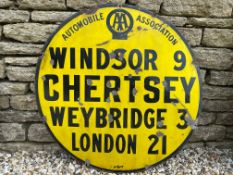An AA circular yellow and black enamel road/village sign for Chertsey, made by Jordan of Bilston,