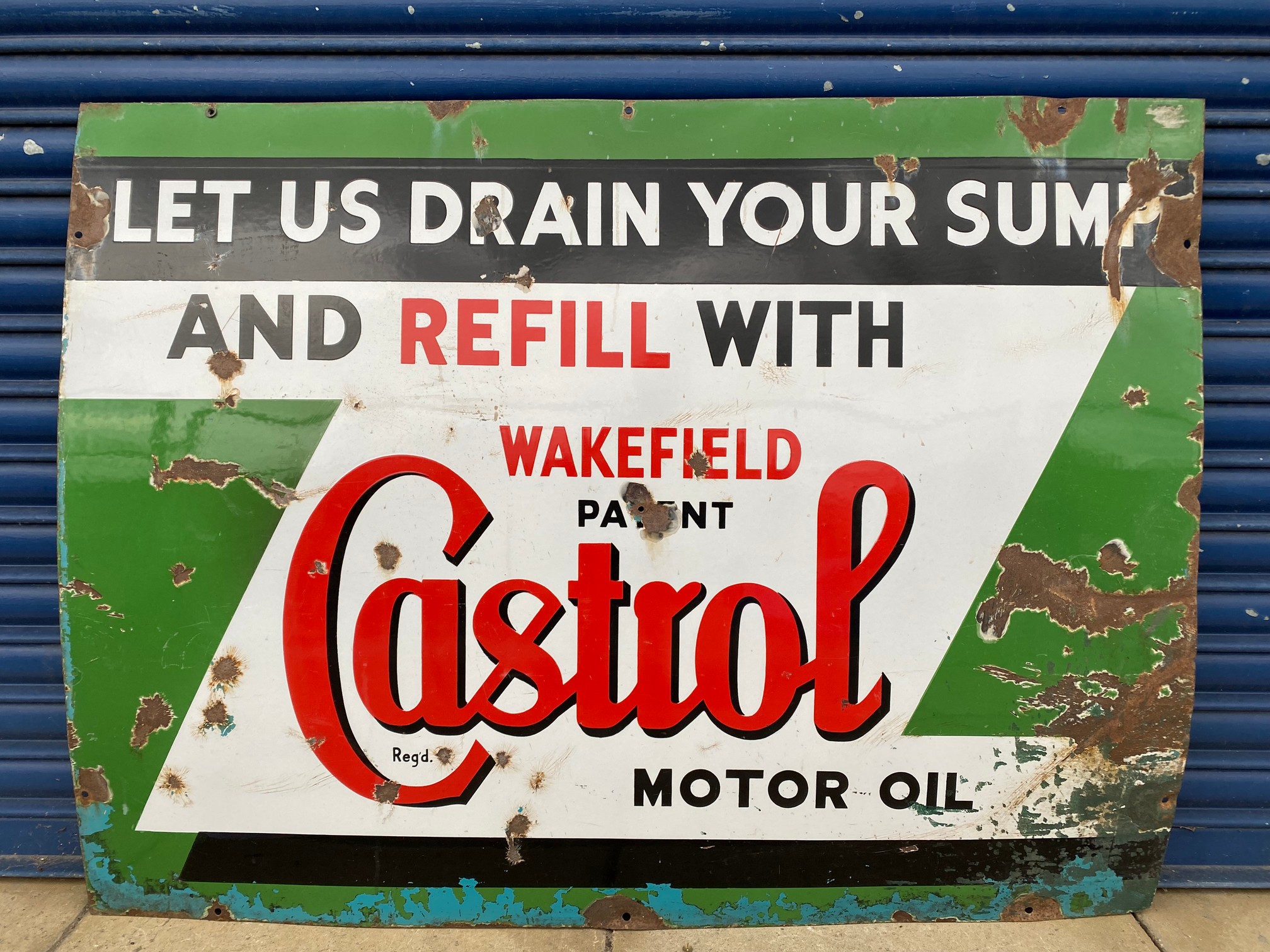 A large Wakefield Castrol 'Let us drain your sump' rectangular enamel sign, 48 x 36".