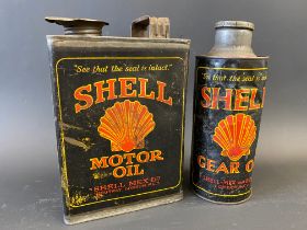A Shell Motor Oil half gallon can, plus a Shell Gear Oil cylindrical quart can, with original cap.