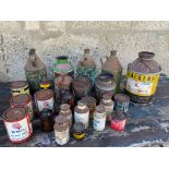 A quantity of early paint and varnish tins.