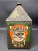 A Liberty Tractalene Tractor Oil five gallon pyramid can.