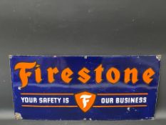 A Firestone enamel sign, possibly Continental or American, 30 x 14".