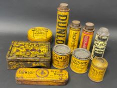 A selection of Dunlop tins including an early Motor Cycle outfit.