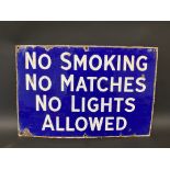 A 'No Smoking No Matches No Lights Allowed' rectangular enamel sign, 18 x 12".