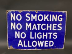 A 'No Smoking No Matches No Lights Allowed' rectangular enamel sign, 18 x 12".