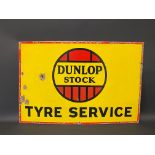 A Dunlop Stock Tyre Service rectangular enamel sign, with good gloss, 30 x 20".