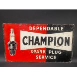 A Champion Dependable Spark Plug Service rectangular tin advertising sign, 23 x 13".