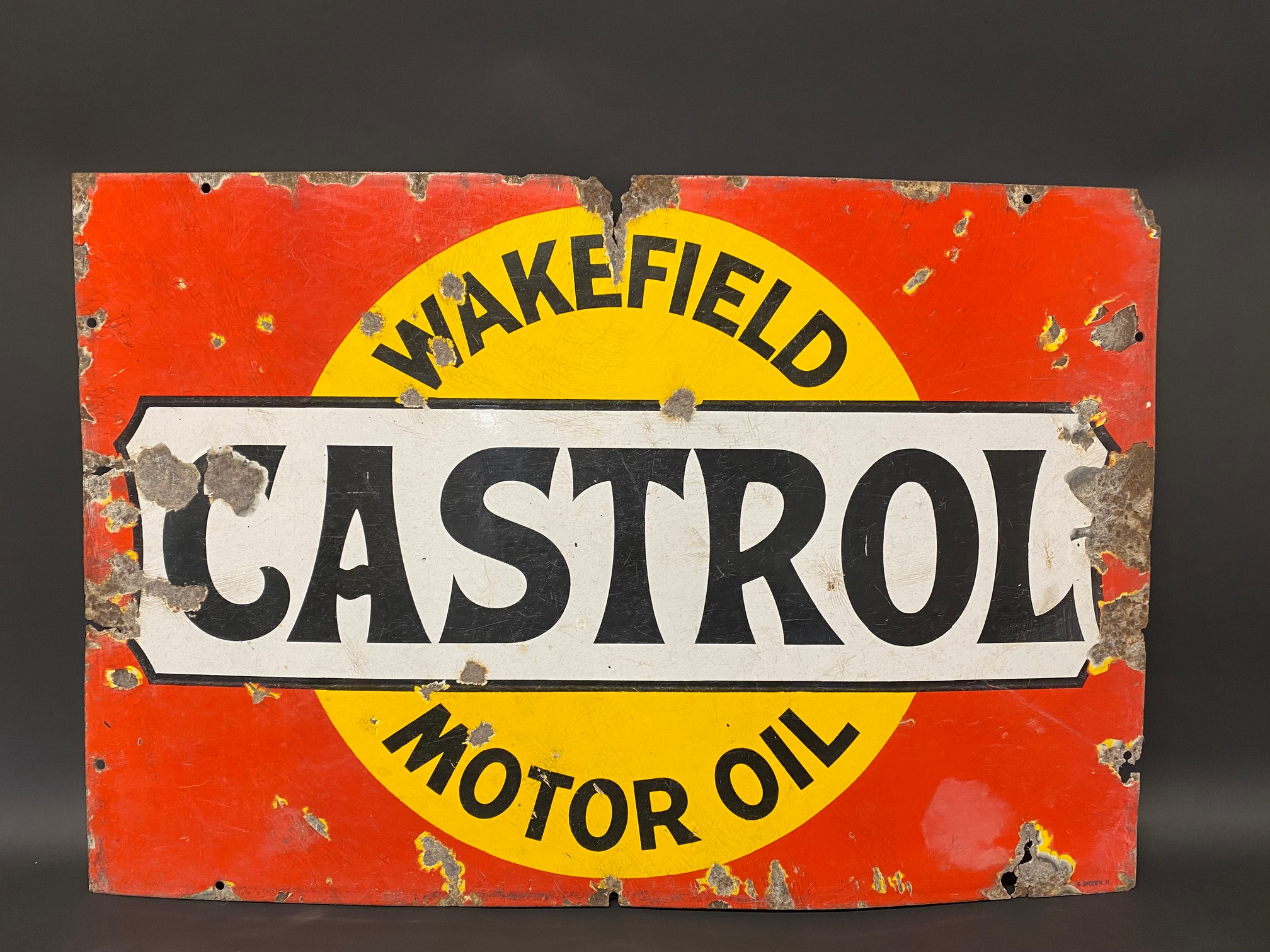 A Wakefield Castrol Motor Oil rectangular enamel sign by Bruton of Palmers Green, 30 x 20".