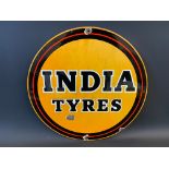 An India Tyres circular enamel sign, 18" diameter.