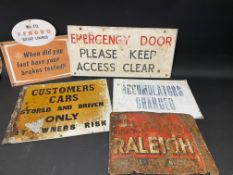 Five assorted garage signs, including Raleigh bicycles.