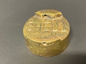 A small Shell two gallon petrol can cap, 1 1/2" diameter.