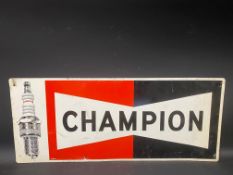 A Champion spark plugs rectangular tin advertising sign, dated 1968, 36 x 15".