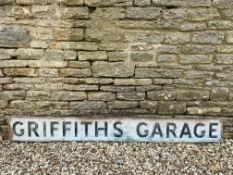 A rectangular metal sign advertising Griffith's Garage, 84 x 10".