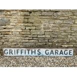 A rectangular metal sign advertising Griffith's Garage, 84 x 10".