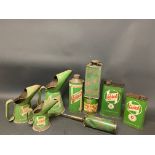 A quantity of Castrol oil cans and measures.