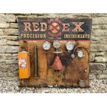 A Redex Precision Instruments garage display board, with various Redex equipment attached, 36 x