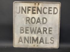 An aluminium road sign 'Unfenced Road Beware Animals', 21 x 21".