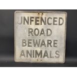 An aluminium road sign 'Unfenced Road Beware Animals', 21 x 21".