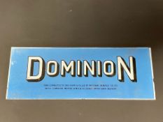 A Dominion glass petrol pump brand indicator sign, 11 x 4 1/4".