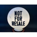 A Not For Resale glass petrol pump globe in good condition.